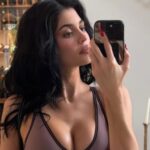 Kylie Jenner spills on her breast implants